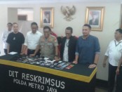 Subdit IV Cyber Crime Ditreskrimsus Polda Metro Jaya menangkap empat Pelaku Driver 'Tuyul' Gojek - foto: Bob/Koranjuri.com