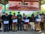 Altar AKABRI 89 membagikan sembako sebanyak 850 paket kepasa masyarakat di Perbatasan NTT - Republik Demokratik Timor Leste (RDTL) di Desa Eban dan Desa Kifu - foto: Istimewa