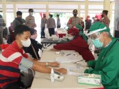 Pelaksanaan vaksinasi massal di Pendopo Wakil Bupati di Kutarjo, Sabtu (26/06/2021), dalam rangka memperingati Hari Bhayangkara ke 75 - foto: Sujono/Koranjuri.com