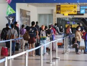 Penumpang di Bandara Ngurah Rai Bali wajib mengunduh aplikasi PeduliLindungi dan menerapkan protokol kesehatan dengan benar terutama penggunaan masker dan menjaga jarak kerumunan - foto: Istimewa