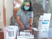 Pemeriksaan deteksi covid menggunakan metode RT-PCR di UPTD Balai Laboratorium Kesehatan Provinsi Bali - foto: Koranjuri.com