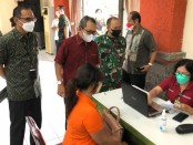 Kantor Perwakilan Bank Indonesia Provinsi Bali bekerja sama dengan PT Bank Danamon Indonesia Provinsi Bali serta Komando Resor Militer (Korem) 163/Wira Satya kembali melaksanakan vaksinasi tahap ketiga atau booster - foto: Istimewa