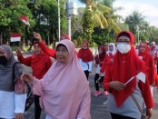 Gerak Jalan Ikatan Persaudaraan Haji Indonesia (IPHI) Kota Denpasar - foto: Istimewa
