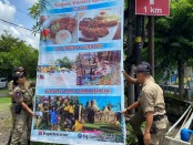 Tim Satuan Polisi Pamong Praja Provinsi Bali dan Kota Denpasar membersihkan baliho maupun spanduk liar di sepanjang jalur yang dilewati delegasi KTT G20 - foto: Istimewa