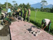 Pavingisasi di kegiatan TMMD Ke-101 di Desa Pangsan, Kecamatan Petang, Kabupaten Badung - foto: Istimewa