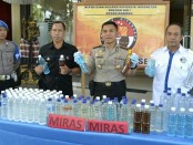 Ratusan liter miras ilegal yang diamankan Polres Badung - foto: Istimewa