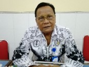 Kepala SMK PGRI 3 Denpasar Nengah Madiadnyana - foto: Koranjuri.com
