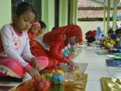 Seratusan anak ramaikan Festival Gebyar PAUD IGTK PGRI Bayan 2019 di kompleks kantor PPK Banyan, Purworejo, Jum'at (15/3/2019) - foto: Sujono/Koranjuri.com