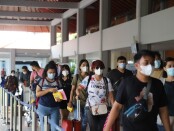 Calon penumpang pesawat di Bandara Internasional I Gusti Ngurah Rai Bali pada puncak arus balik libur Paskah 2021, Minggu, 4 April 2021 - foto: Istimewa