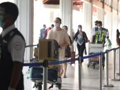 Penerapan protokol kesehatan wajib masker bagi calon penumpang melalui Bandara I Gusti Ngurah Rai Bali sebelum peniadaan mudik Idul Fitri 1442 H - foto: Istimewa
