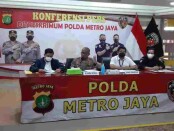Kabid Humas Polda Metro Jaya Kombes Pol Yusri Yunus memberikan keterangan pers terkait pengungkapan Resmob Ditkrimum Polda Metro Jaya - foto: Istimewa