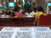 QR Code QRIS yang dipampang di GPIB Maranatha Denpasar untuk persembahan jemaat dalam ibadah malam Natal - foto: Koranjuri.com