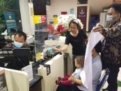 Proses perekaman wajah pelayanan Paspor Simpatik di Kantor Imigrasi Ngurah Rai - foto: Istimewa