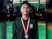Nur Fikri Mardiyanto, siswa kelas X TJKT SMK PANSA Kutoarjo, peraih juara 2 cabor Pencak Silat Popda Tingkat Kabupaten Purworejo tahun 2023 jenjang  SMA/SMK - foto: Koranjuri.com