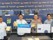 Subdit IV Tipid Siber Ditreskrimsus Polda Metro Jaya menangkap 2 tersangka berinisial L (52) dan B (22) dalam kasus penipuan trading - foto: Istimewa