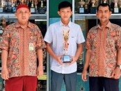 Irfan Safaruddin didampingi Kepala SMK YPP Purworejo Mugi Widodo, S.Pd., dan pembimbing LKS, Sugiatno, S.Pd. - foto: Koranjuri.com