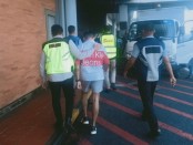 Mahasiswa asal Medan diamankan petugas aviasi bandara I Gusti Ngurah Rai Bali akibat keisengannya menyebut bawa bom di tas - foto: Istimewa