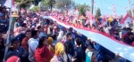 Warga Keburuhan di Purworejo Bentangkan Bendera Merah Putih Sepanjang 1.001 Meter